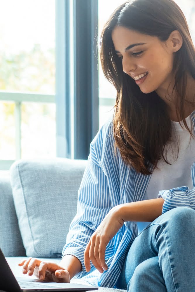 Important,documents.,serene,female,manager,sitting,on,the,sofa,engaged